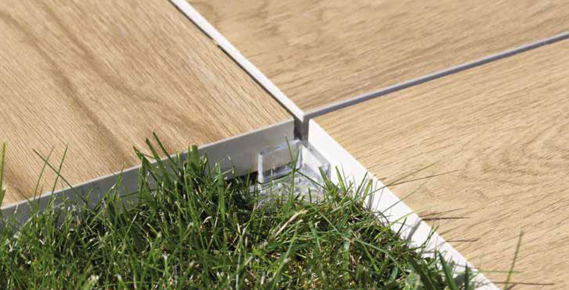 Tiles supported and spaced with StrataRise Clear Paver Support Spacers